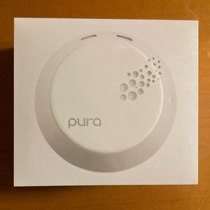 New in box Pura diffuser with 2 fragrance refills.